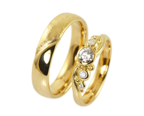 Bølgende diamant forlovelsesring 5 diamanter